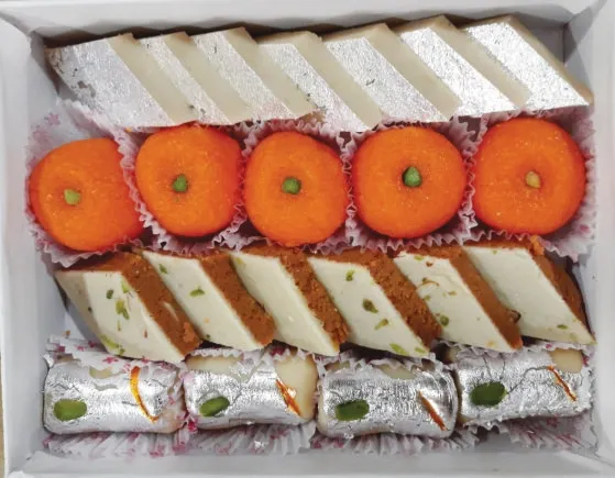 Mawa Roll, Chocolate Burfi, Orange Laddu, Cashew Katli