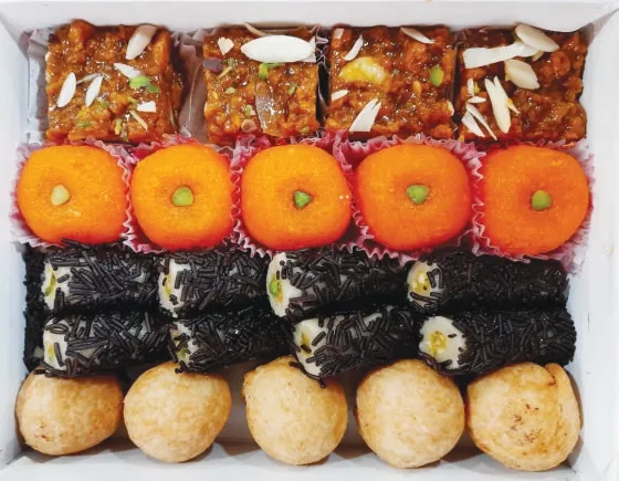 Mini Kachori, Kaju Cadbury Roll, Orange Laddu, Doda Burfi