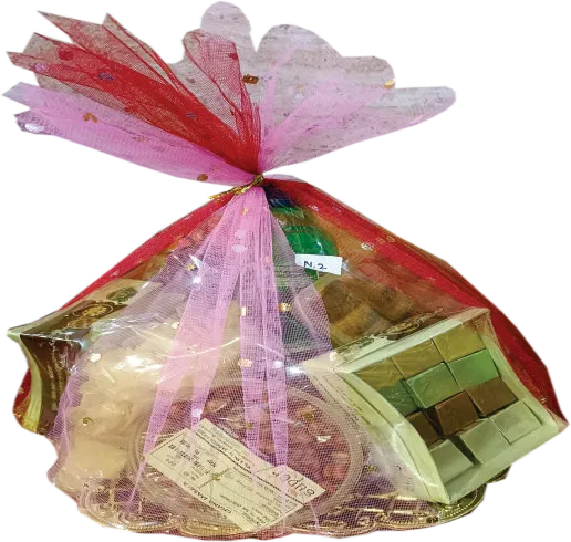 Kaju Bite 250g, Doda Bar 250g, Namkeen 250g., Saloni 250g.
                    Chana Masala 250g., Cream Roll 3 pcs., Chocolate Cookies 1box,
                    Aloo Chips 1pkt., Chocolate 1 box, Pepsi small.